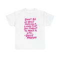 Dolly Parton Quote Tee — "Don't Be So Busy Making a Living" Pink Handwritten Graphic T-Shirt