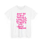 Dolly Parton Quote Tee — "Don't Be So Busy Making a Living" Pink Handwritten Graphic T-Shirt